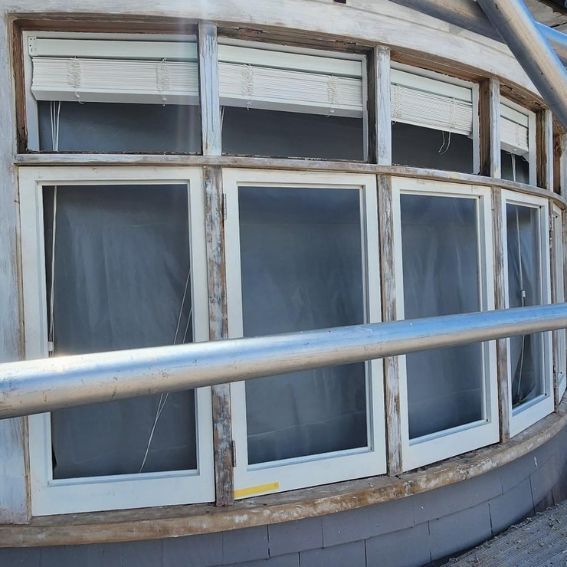 A bay window, mid process through the retrofitting double glazed windows